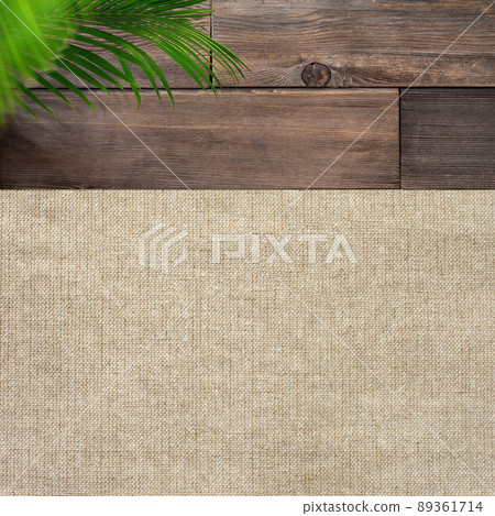 Natural background of palm leaves and wood grain Natural background of palm leaves and wood grain 89361714