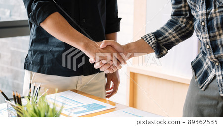 business people handshake for teamwork of business merger and acquisition 89362535