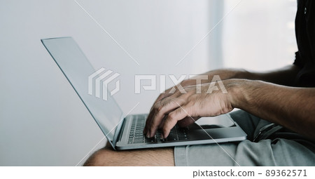 Close up man using smart laptop at home Close up man using smart laptop at home 89362571