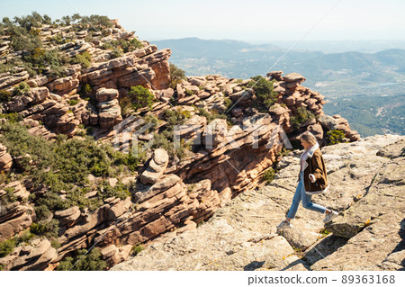 girl on the rocky mountain Garbi in Spain 89363168
