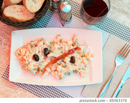 Banquet in restaurant - Spanish salad with potatoes, tuna, olives and egg Banquet in restaurant - Spanish salad with potatoes, tuna, olives and egg 89363378
