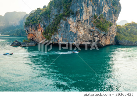 Sea views and rocky islands with a long-tail boat. Sea views and rocky islands with a long-tail boat. 89363425