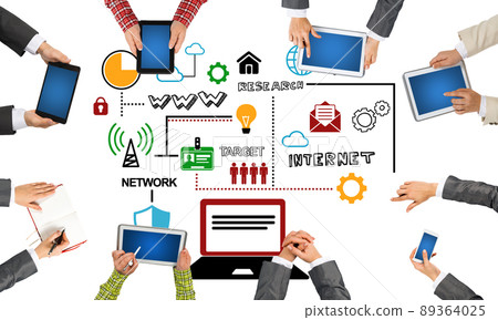 Top view of businesspeople sitting at table and using gadgets Top view of businesspeople sitting at table and using gadgets 89364025