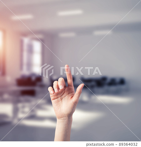 Choosing gesture of person in elegant modern interior in sunshine light Choosing gesture of person in elegant modern interior in sunshine light 89364032