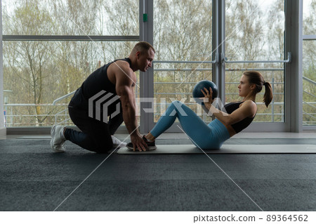 Woman boyfriend exercise doing mat beautiful happy coach sport gym, for training muscle for healthy for couple crunch, girl male. Home stomach aerobic, 89364562