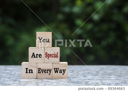 You are special in every way text on wooden blocks with blurred nature background. Motivational concept You are special in every way text on wooden blocks with blurred nature background. Motivational concept 89364663
