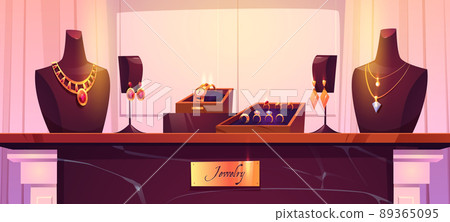 Jewelry shop display with gold necklaces, rings 89365095