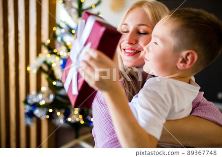 young mother and little son, lifestyle holiday people concept self-isolation in quarantine due to coronavirus young mother and little son, lifestyle holiday people concept self-isolation in quarantine due to coronavirus 89367748