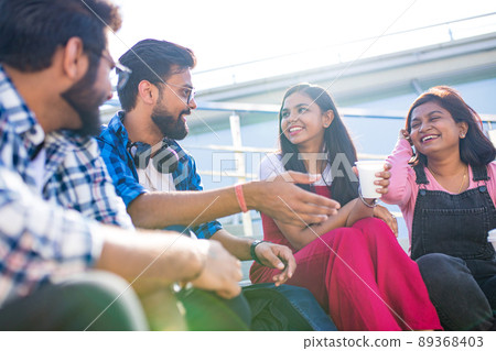 infian best friends spending time together outdoors in spring park infian best friends spending time together outdoors in spring park 89368403