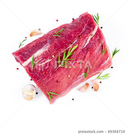 large piece of meat, raw beef fillet isolated on white background. Striploin with rosemary large piece of meat, raw beef fillet isolated on white background. Striploin with rosemary 89368710
