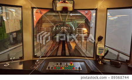 View of the driver cabin of an empty tram View of the driver cabin of an empty tram 89368744