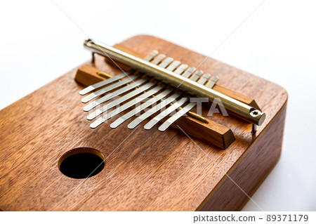 Traditional wooden kalimba isolated on white Traditional wooden kalimba isolated on white 89371179