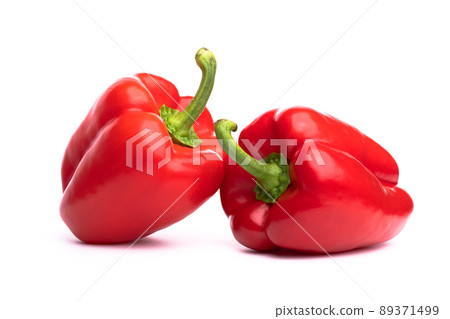 White background photo of two red paprika 89371499
