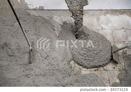 Concrete road construction at the construction site Concrete road construction at the construction site 89373228