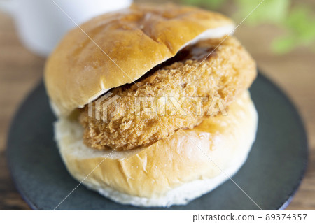 Delicious croquette sandwich and hot coffee Delicious croquette sandwich and hot coffee 89374357