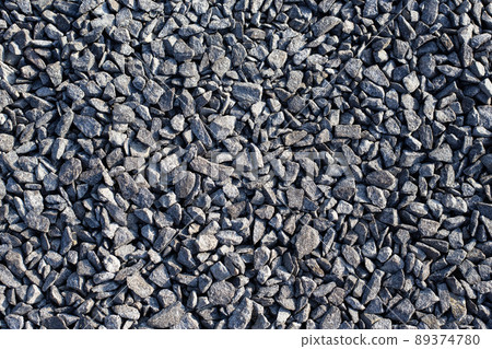 Stone, crushed stone texture background. Top view, close-up. Stone sea beach close-up. High quality photo. Stone, crushed stone texture background. Top view, close-up. Stone sea beach close-up. High quality photo. 89374780