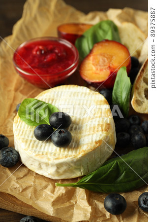 Concept of tasty food with grilled camembert, close up 89375887
