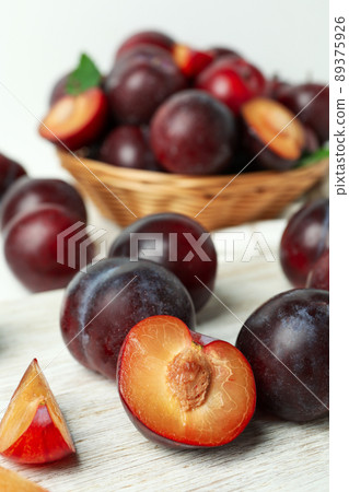 Concept of fruit with plums, close up and selective focus Concept of fruit with plums, close up and selective focus 89375926