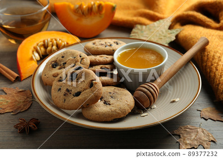 Concept of tasty food with pumpkin cookies, close up 89377232