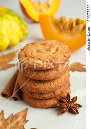 Pumpkin cookies on white textured background, close up 89377233