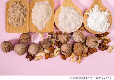 Alternative nut flour. Vegan baking. Almond, walnut, cashew flour. Flat lay 89377365