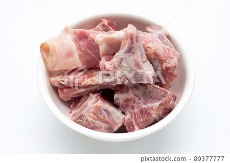 Raw pork bone isolated on white background. Raw pork bone isolated on white background. 89377777