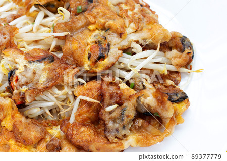 Crispy fried mussel pancake with bean sprout Crispy fried mussel pancake with bean sprout 89377779