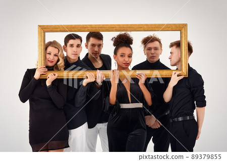 studio portrait of Beautiful young diverse group of friends isolated on white background in the frame for a picture, goofy face, good mood studio portrait of Beautiful young diverse group of friends isolated on white background in the frame for a picture, goofy face, good mood 89379855