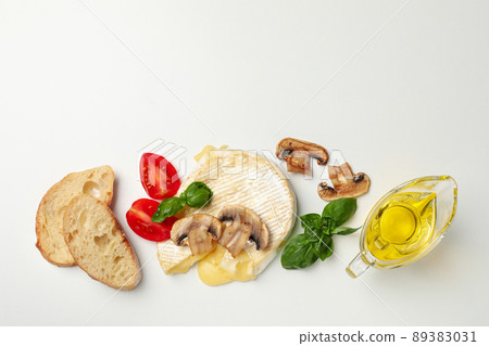 Concept of tasty food with grilled camembert on white background 89383031