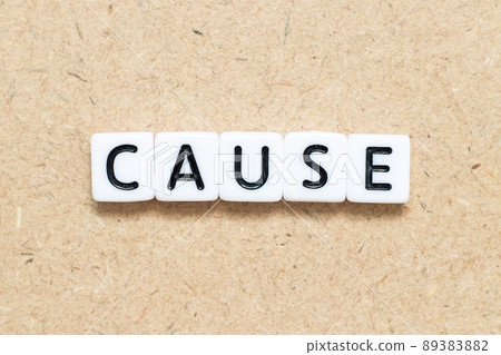 White tile alphabet letter with word cause on wood background 89383882