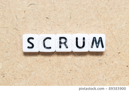 White tile alphabet letter with word scrum on wood background White tile alphabet letter with word scrum on wood background 89383900