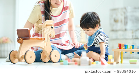 Image of a female childcare worker in her 20s Image of a female childcare worker in her 20s 89384010