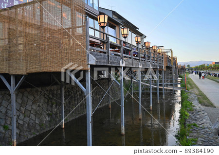 Take a walk through the cool floor of Kamogawa, Kyoto City at dusk Take a walk through the cool floor of Kamogawa, Kyoto City at dusk 89384190