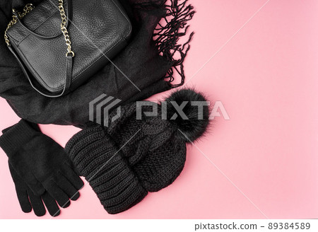 Flat lay winter or autumn warm woman accessories - black knitted scarf, hat, Flat lay winter or autumn warm woman accessories - black knitted scarf, hat, 89384589