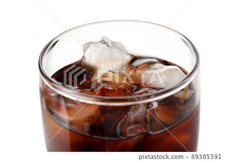 Glass of cola with ice isolated on white background 89385591