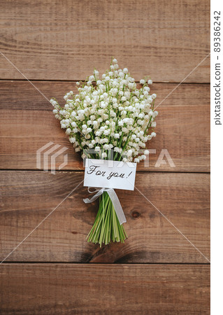 Beautiful bouquet of lilies of the valley. Spring time Beautiful bouquet of lilies of the valley. Spring time 89386242