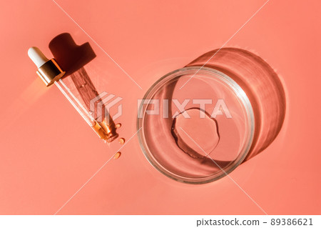 Laboratory glass petri with pipette and drop of water, serum, oil, beauty product. Natural medicine, cosmetic research, bio science. Concept of skincare and analysis. Dermatology. Flat lay, top view 89386621