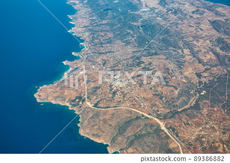 Aerial view over the Karpass Peninsula in Cyprus 89386882