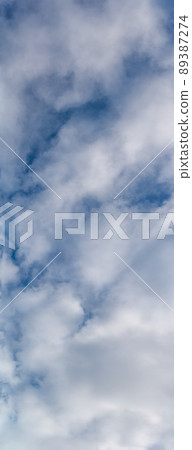 Fantastic clouds against blue sky, panorama 89387274
