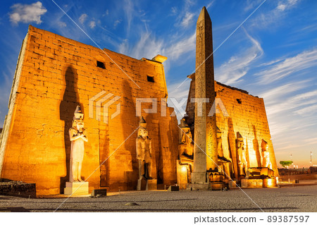 Luxor Temple side view with Pylon and obelisk beautiful sunset light, Egypt Luxor Temple side view with Pylon and obelisk beautiful sunset light, Egypt 89387597