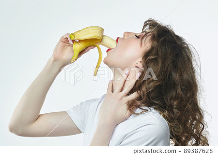 attractive girl with red lipstick shoved a banana deep into her mouth attractive girl with red lipstick shoved a banana deep into her mouth 89387628