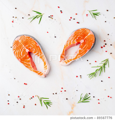 Food background, salmon steaks and seasonings 89387776