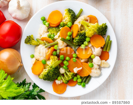 Mix of boiled vegetables, steam vegetables for dietary low-calorie diet 89387860