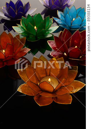 Happy Vesak Day Buddha Purnima Background. Candles during Vesak day celebration. 89388134