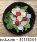 Fresh radish and arugula salad 89388304