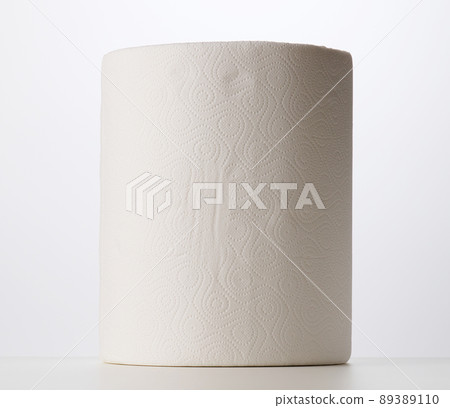 Soft white paper towel on a white background, disposable kitchen towel. 89389110
