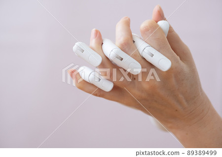 Robot and human fingers are intertwined. Love and passion between machine and man. Or a relationship with a disabled person who lost his arm. Prosthetic arm 89389499