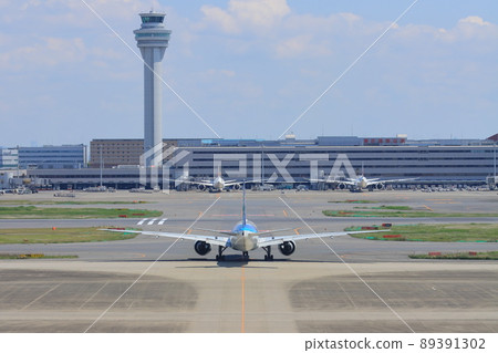 Passenger plane heading to the runway Jet plane Airport travel image Departure image 89391302