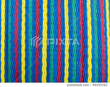 The surface, weaving work of Asian people, many colors, used to make mats, try to sit in patterns that represent the culture of each area. The surface, weaving work of Asian people, many colors, used to make mats, try to sit in patterns that represent the culture of each area. 89393582