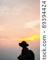 Outdoor summer lifestyle Standing for a photo while the sun is going down.people and copy space in silhouette. 89394424